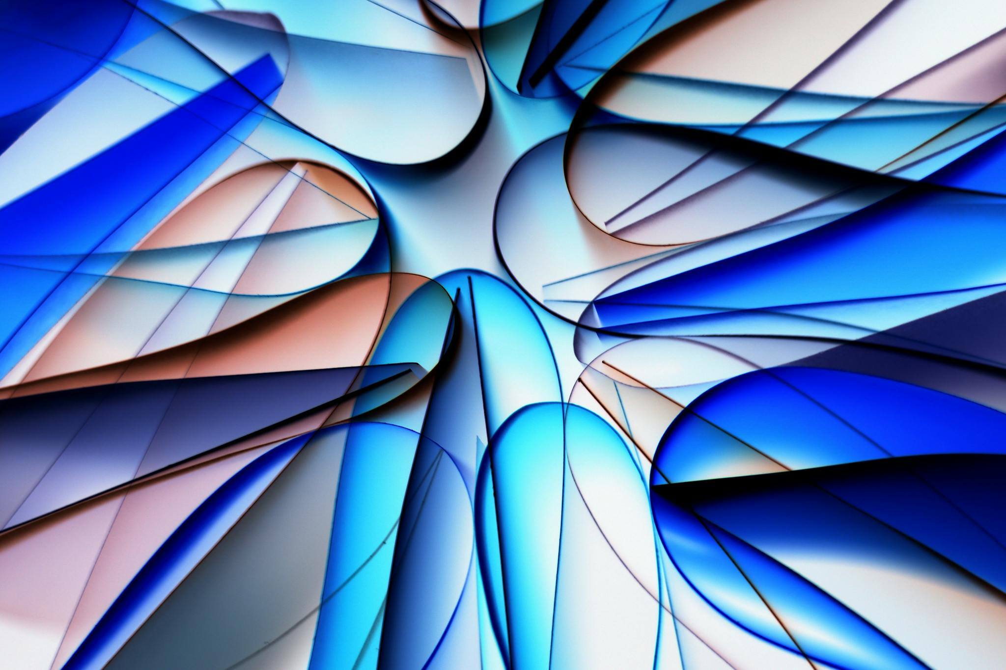Abstract geometric art featuring dynamic blue forms creating a captivating visual display.